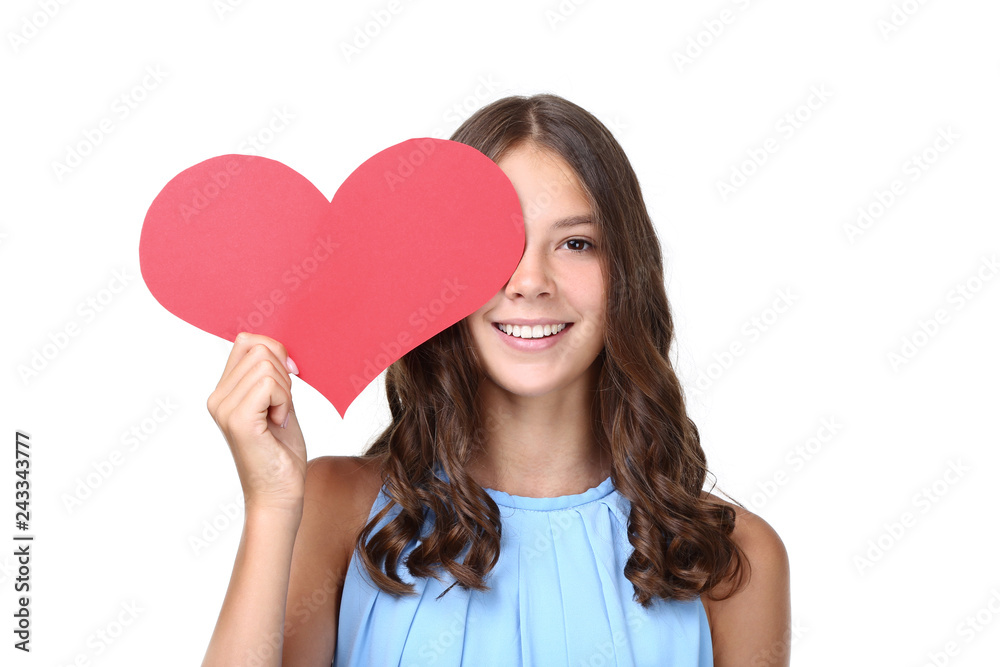 Young girl holding red paper heart on white background Young girl holding red paper heart on white background