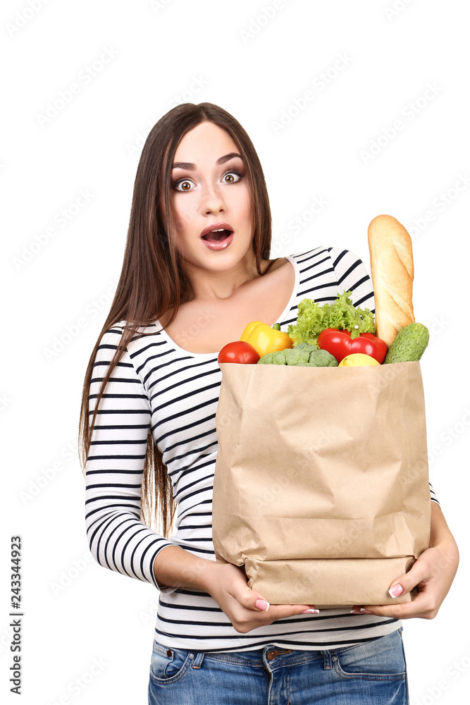 Beautiful woman holding grocery shopping bag on white background Beautiful woman holding grocery shopping bag on white background