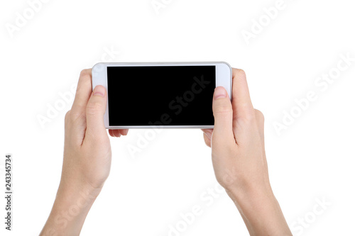 Female hands holding smartphone on white background