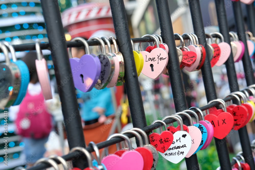 Lots of locks with an inscription of love in a row