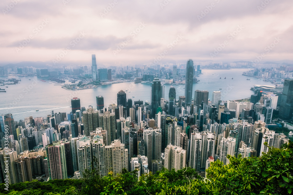 Modern City and Business with foggy weather from Victoria Peak, Hong Kong.