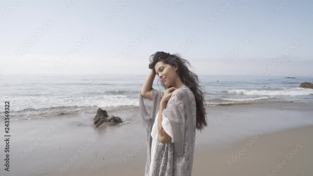 young woman happy at the beach. summer feeling young woman happy at the beach. summer feeling