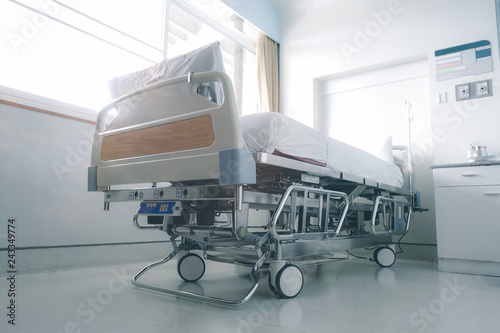 Canvas Print Empty hospital bed in hospital ward