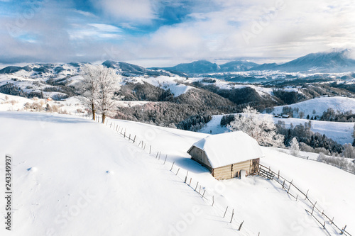 Heavy snowfall over the traditional village Sirnea in Transylvania, Romania © Calin Stan
