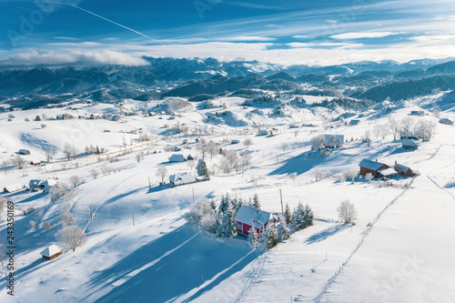 The traditional village Pestera in the Carpathians in winter time