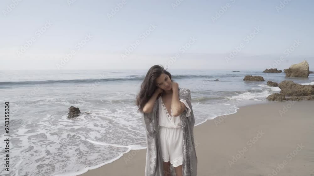 young woman happy at the beach. summer feeling young woman happy at the beach. summer feeling