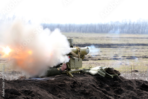 the time of the shot of ATGM, anti-tank guided missile, Ukraine and Donbass conflict photo