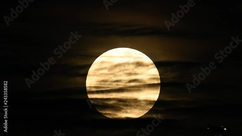 Full moon airplane crossing