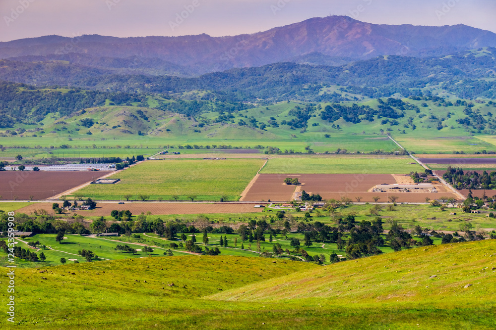 Aerial view of agricultural fields, mountain background, south San Francisco bay, San Jose, California