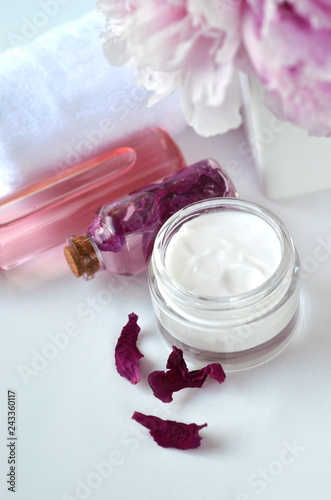 Beauty luxury Spa skincare and creams with pink peonies - cosmetic cream and flower