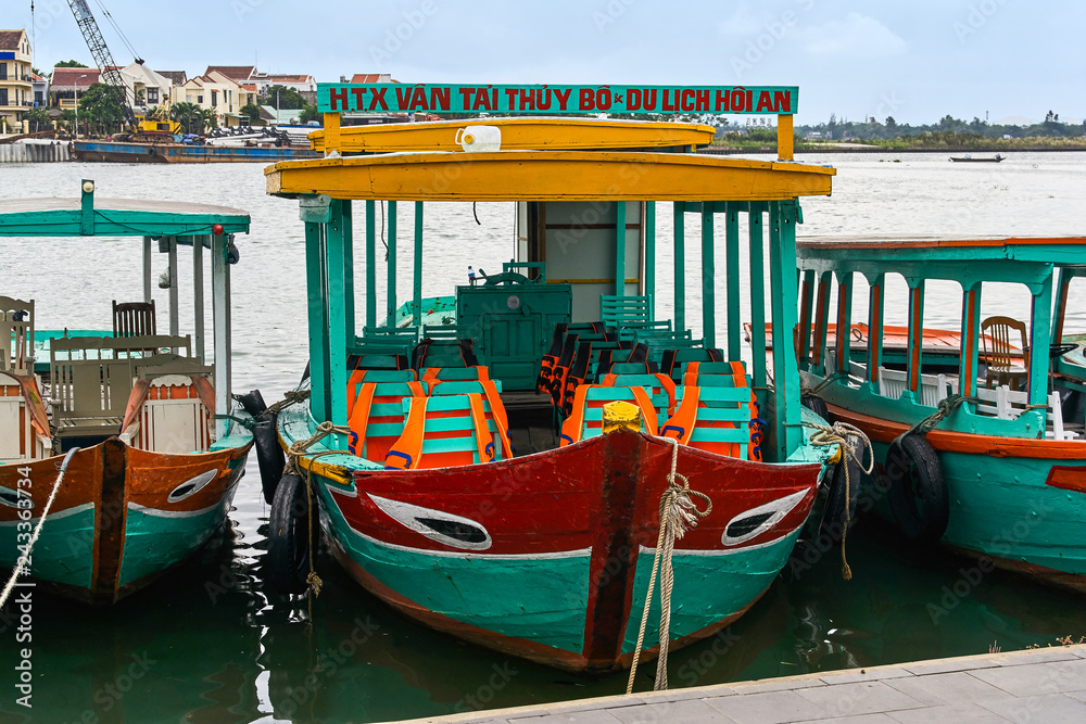 HOI AN, VIETNAM - NOVEMBER 2, 2018: Cruise boat on the river HOI AN, VIETNAM - NOVEMBER 2, 2018: Cruise boat on the river
