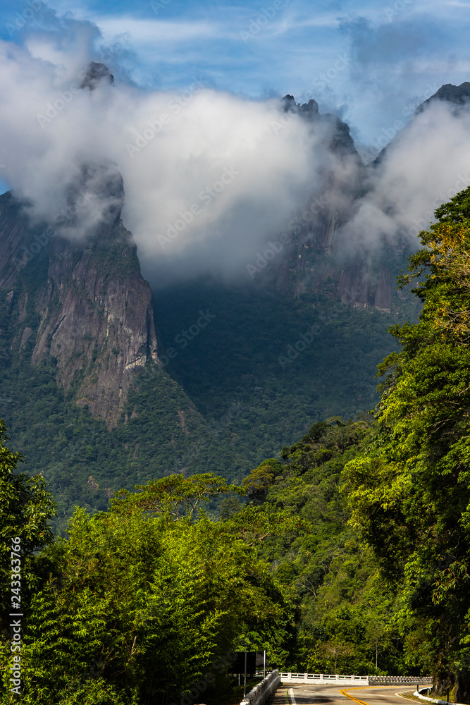 Beautiful landscape of mountains and morning mist. Mountain of the Finger of God. city of Teresópolis, state of Rio de Janeiro, Brazil, South America. 