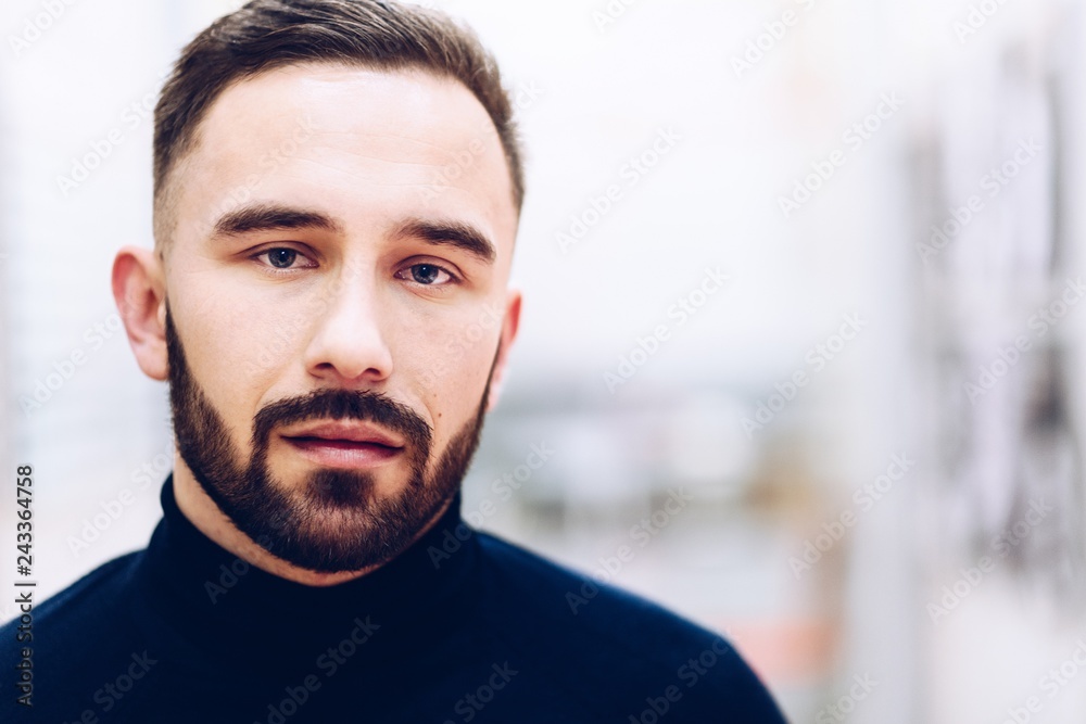Fototapeta premium Caucasian confident businessman in his office.