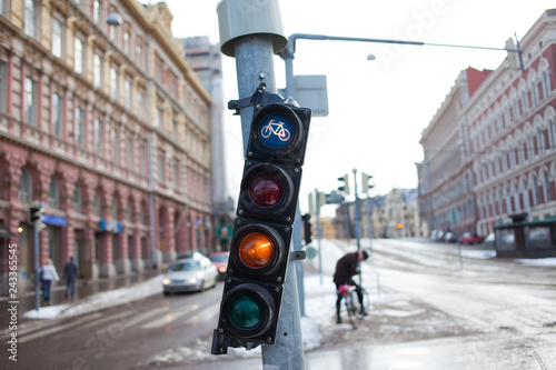 HELSINKI, FINLAND - MARCH 20, 2011: Traffic light with a signal for the bike. Ecological transport in the city. 
