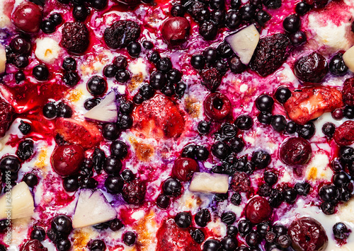 pizza with berries and fruits on the white background