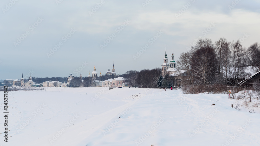 Fototapeta premium Winter view of embankment in Veliky Ustyug