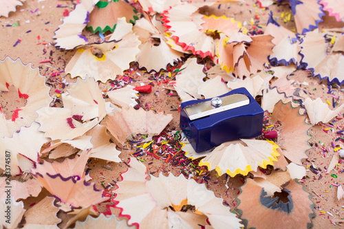 Pencil shapener on pencil shavings photo