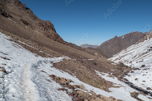 Jebel Toubkal winter ascent in high atlas mountains in morocco © luciezr