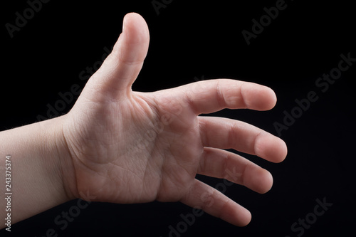 Five  fingers of a human hand partly seen in view photo