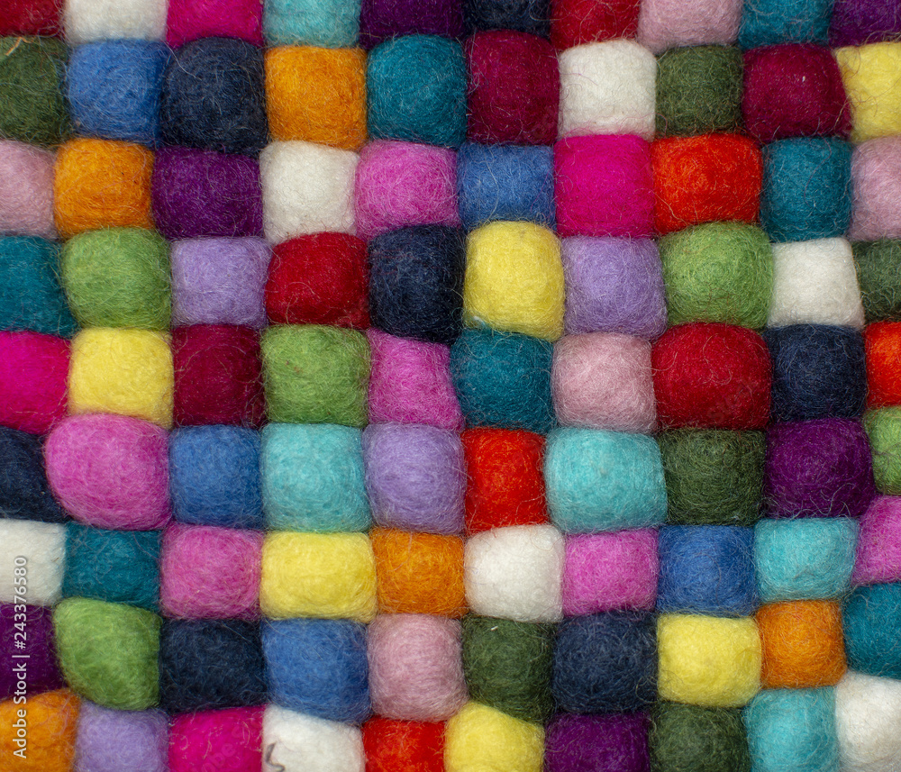 Colorful felted little balls full frame Colorful felted little balls full frame