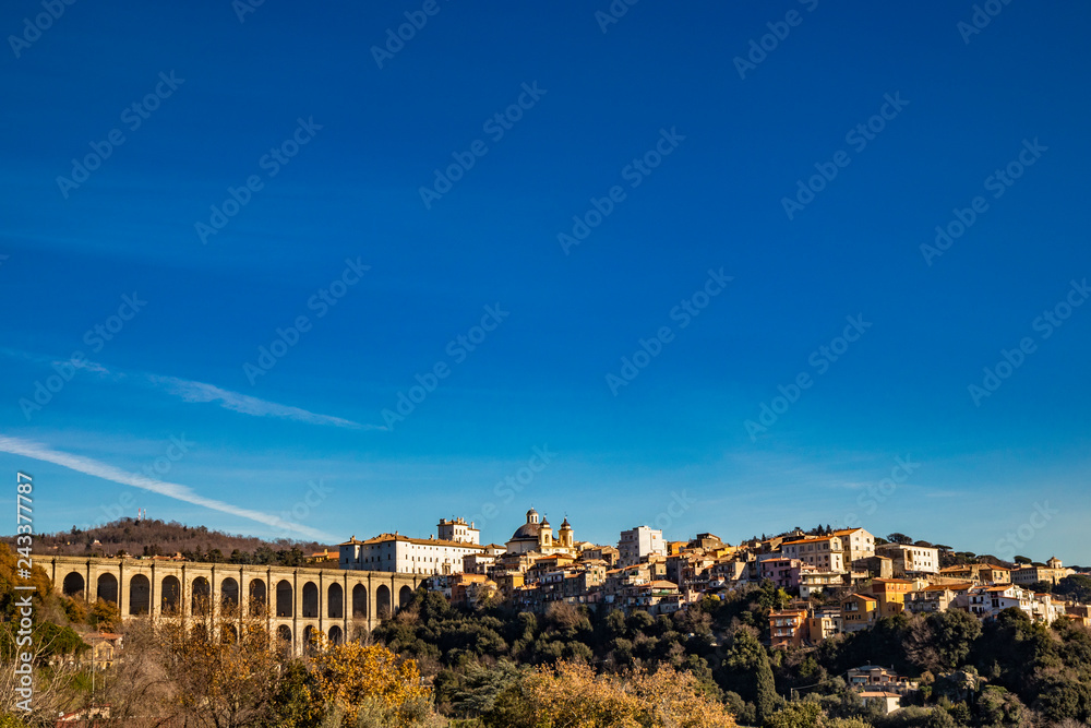 View of Ariccia, with the monumental bridge, the baroque Chigi palace and the church of Santa Maria Assunta by Gian Lorenzo Bernini. Castelli Romani, Lazio, Italy.