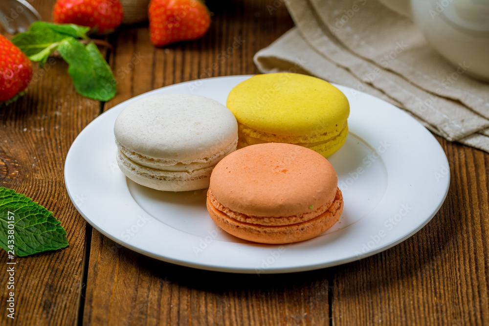 multicolored macaroons in plate multicolored macaroons in plate