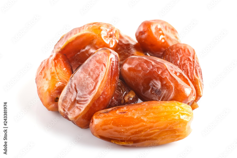 Pile of dried dates isolated on white background.
