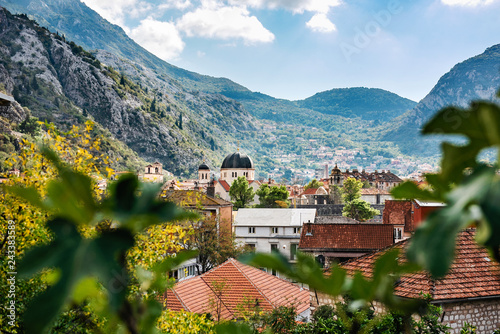 View on old town of Kotor, on roofs, mountain and church UNESCO, Montenegro, Europe