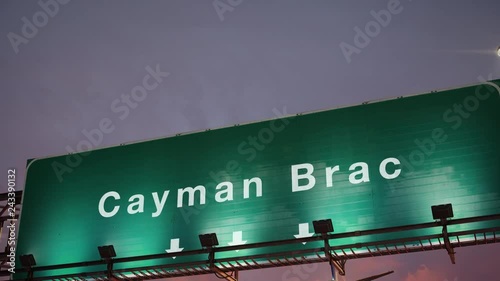 Airplane Landing Cayman Brac during a wonderful sunrise photo