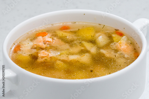 fish soup with salmon in a ceramic Cup