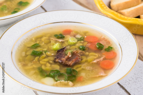 Homemade pea soup with smoked bacon.