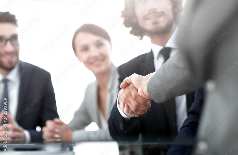 background image of handshake of business partners background image of handshake of business partners