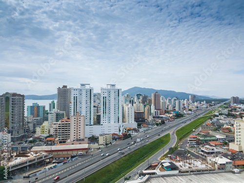 Beautiful tropical beach and city in Itapema SC Brazil photo