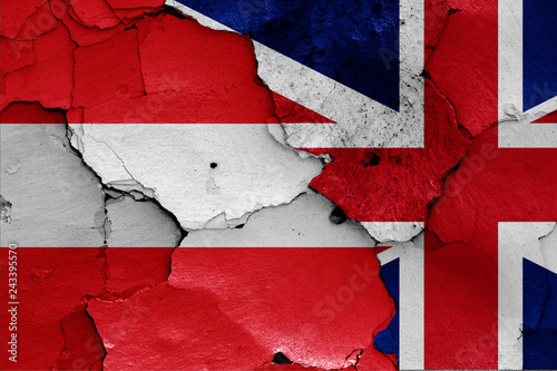 flags of Austria and UK painted on cracked wall
