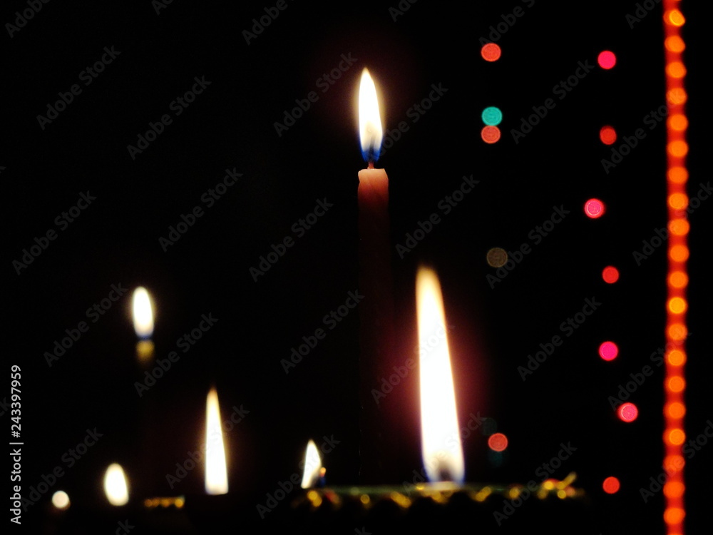 candles on black background candles on black background