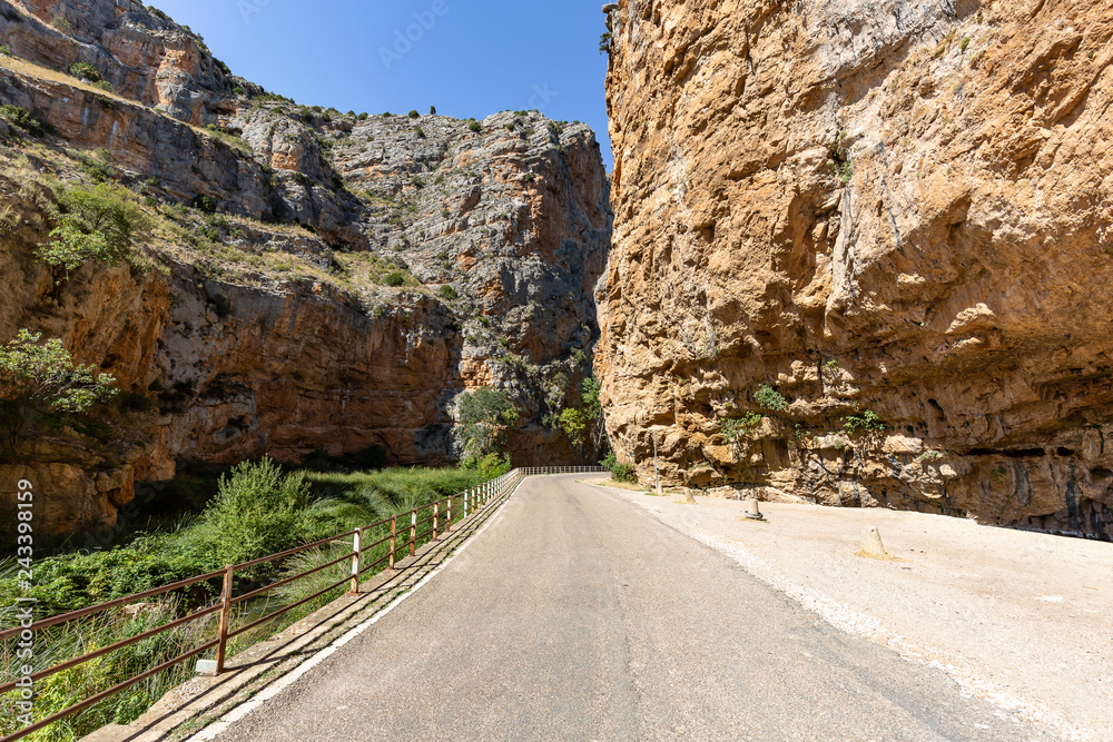 paved road in the canyon of the Mesa river next to Jaraba town, province of Zaragoza, Aragon, Spain paved road in the canyon of the Mesa river next to Jaraba town, province of Zaragoza, Aragon, Spain