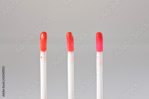 Brush of liquid lipstick. Lipgloss stick.