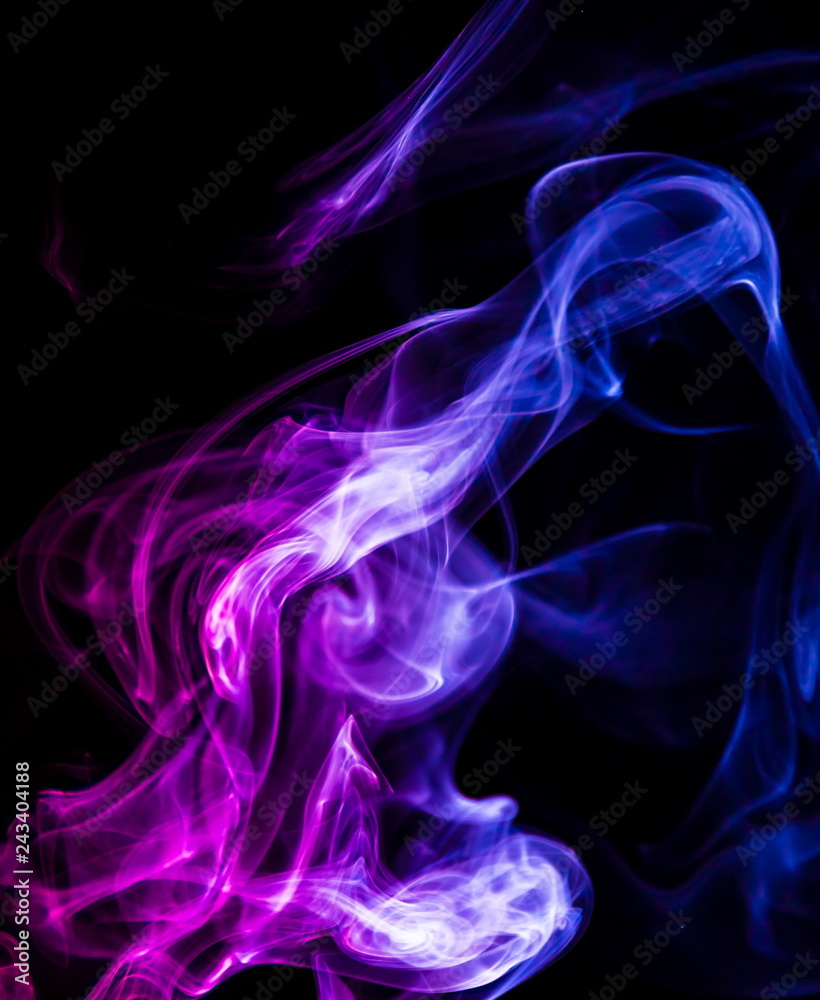 Colored smoke on black background Colored smoke on black background