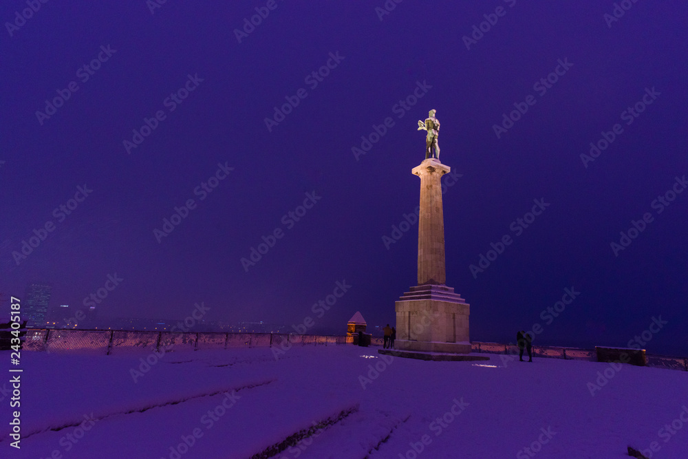 View of Kalemegdan Park in Belgrade the capital of Serbia in Europe during snow in winter in the evening