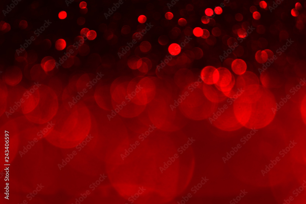 Valentine's day red lights defocused background. Red bokeh concept.
