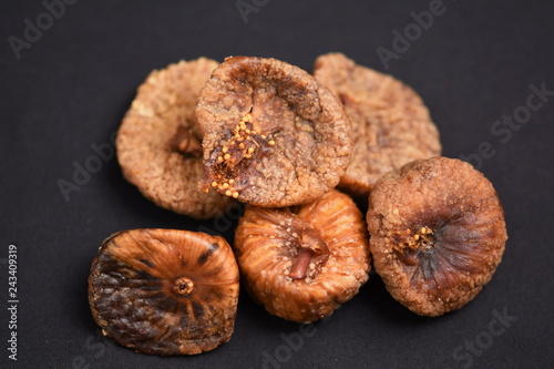 Dried figs isolated on a black background