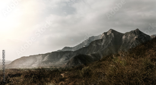 landscape with mountains and clouds