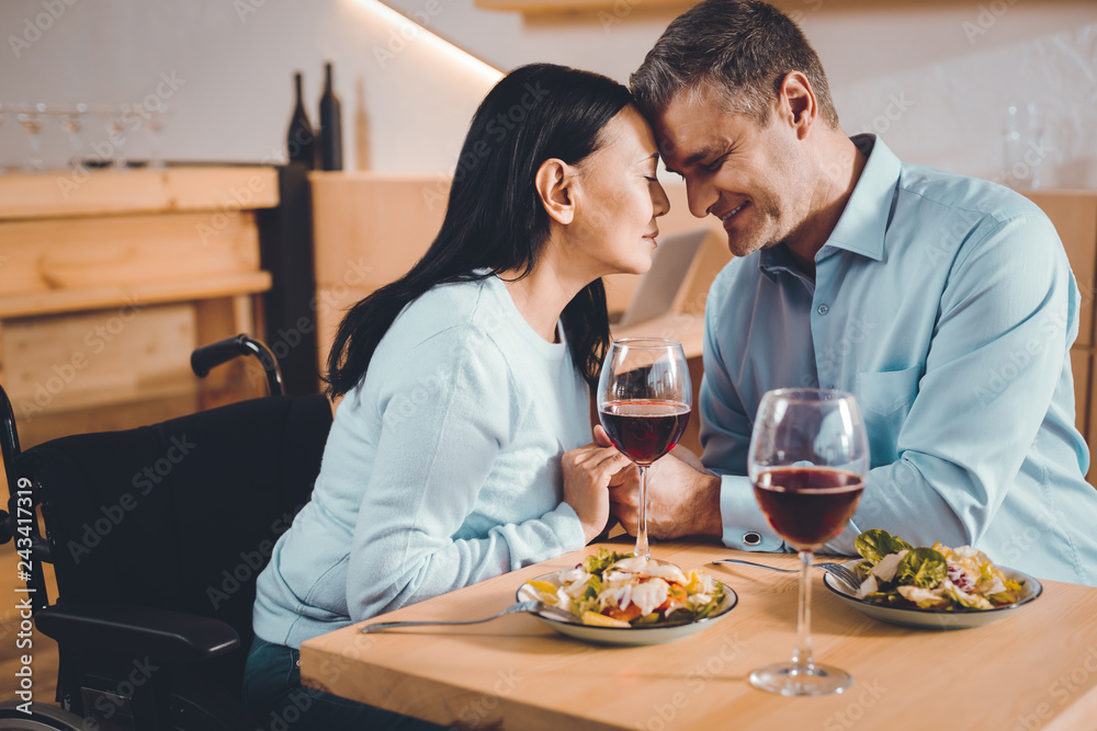 Enamored couple having a romantic dinner