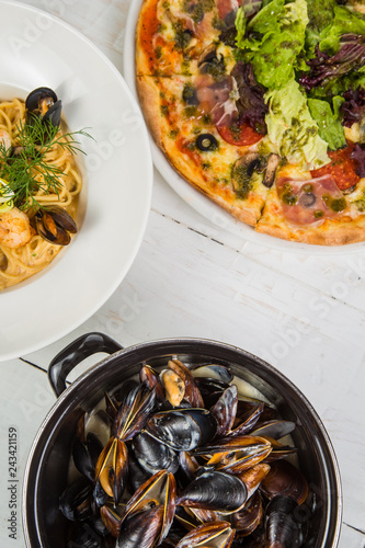 Shellfish Mussels in copper bowl photo