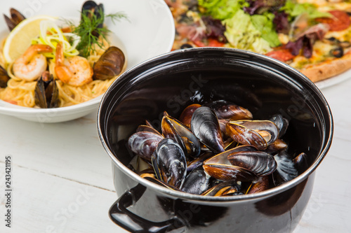 Shellfish Mussels in copper bowl photo