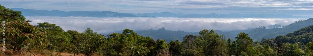Panorama of Mountain fog sky clouds landscape