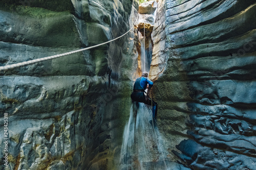 Fotografija Waterfall rappelling