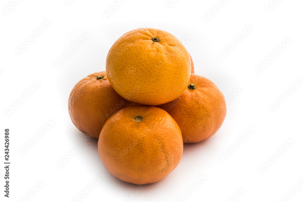 Ripe mandarines isolated on a white background Ripe mandarines isolated on a white background