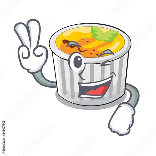 Two finger creme brule in white cartoon bowl