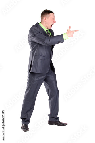 Foto Angry businessman or boss is scolding someone and is pointing ahead by his index finger isolated on the white background